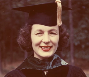 Photo of Dr. Sliepcevich in graduation cap and gown